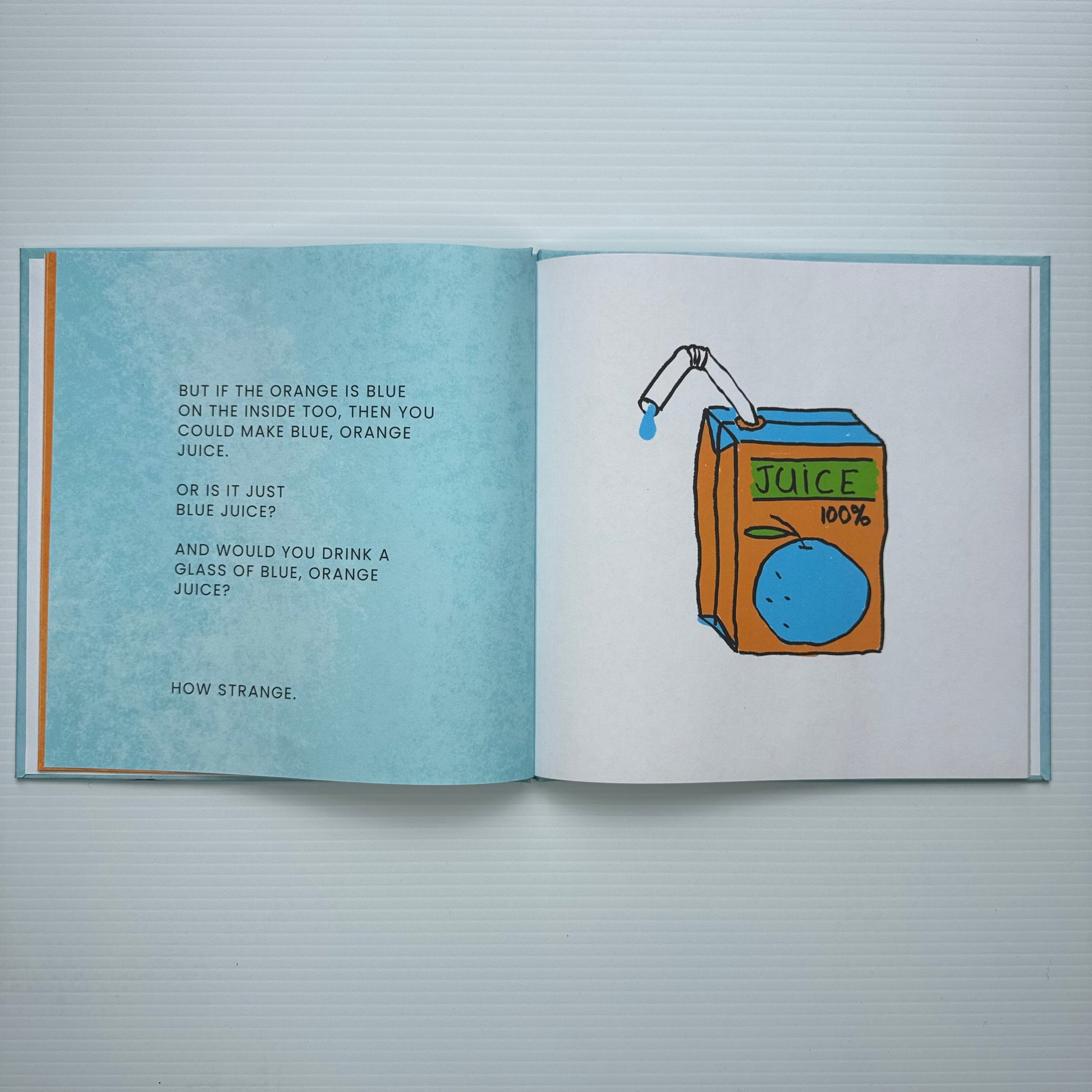 Open book with text and juice box 